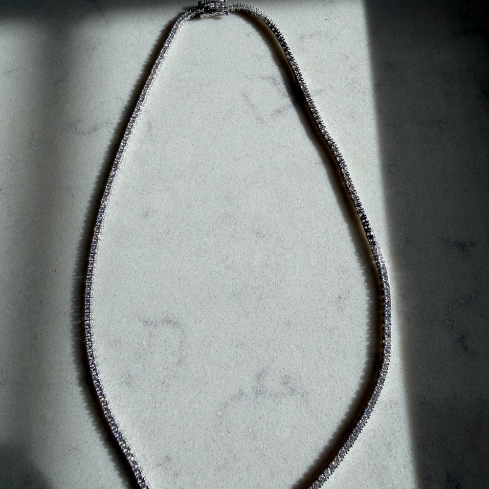 Elegant Silver and Moissanite tennis necklace..